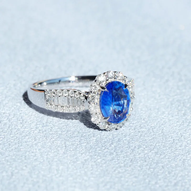 Halo Oval Cut Blue Sapphire Engagement Ring in Sterling Silver