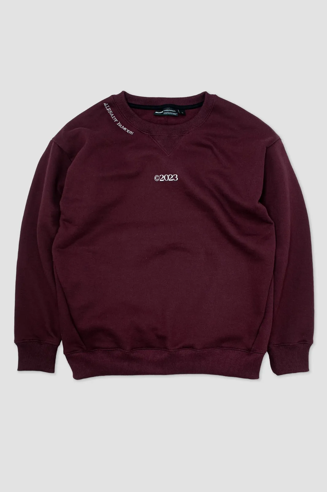 Polera Sweatshirt Famous Vino